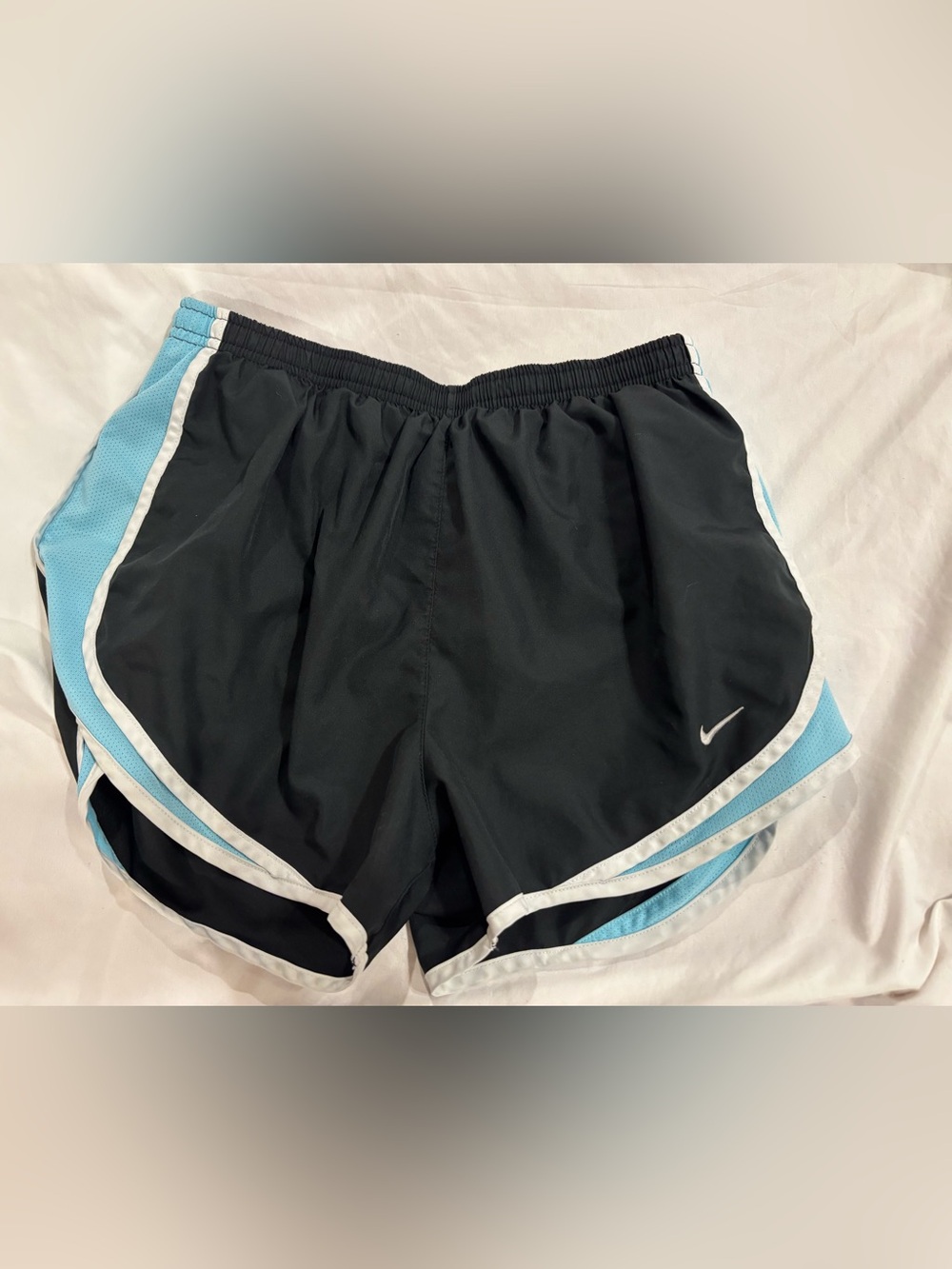 Nike Women’s Black Athletic Shorts with Light Blue and White Trim